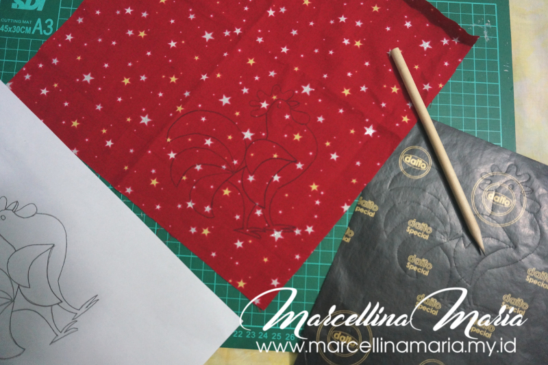 DIY napkin with rooster hand embroidery to celebrate chinese new year.