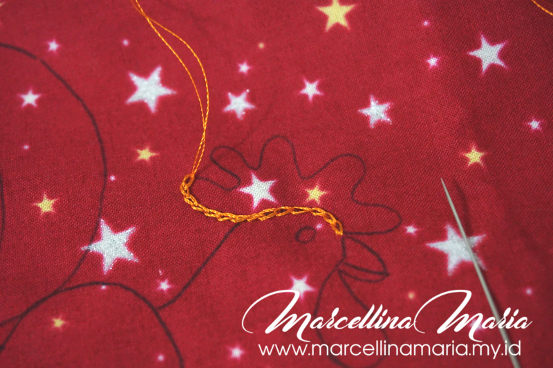 DIY napkin with rooster hand embroidery to celebrate chinese new year.